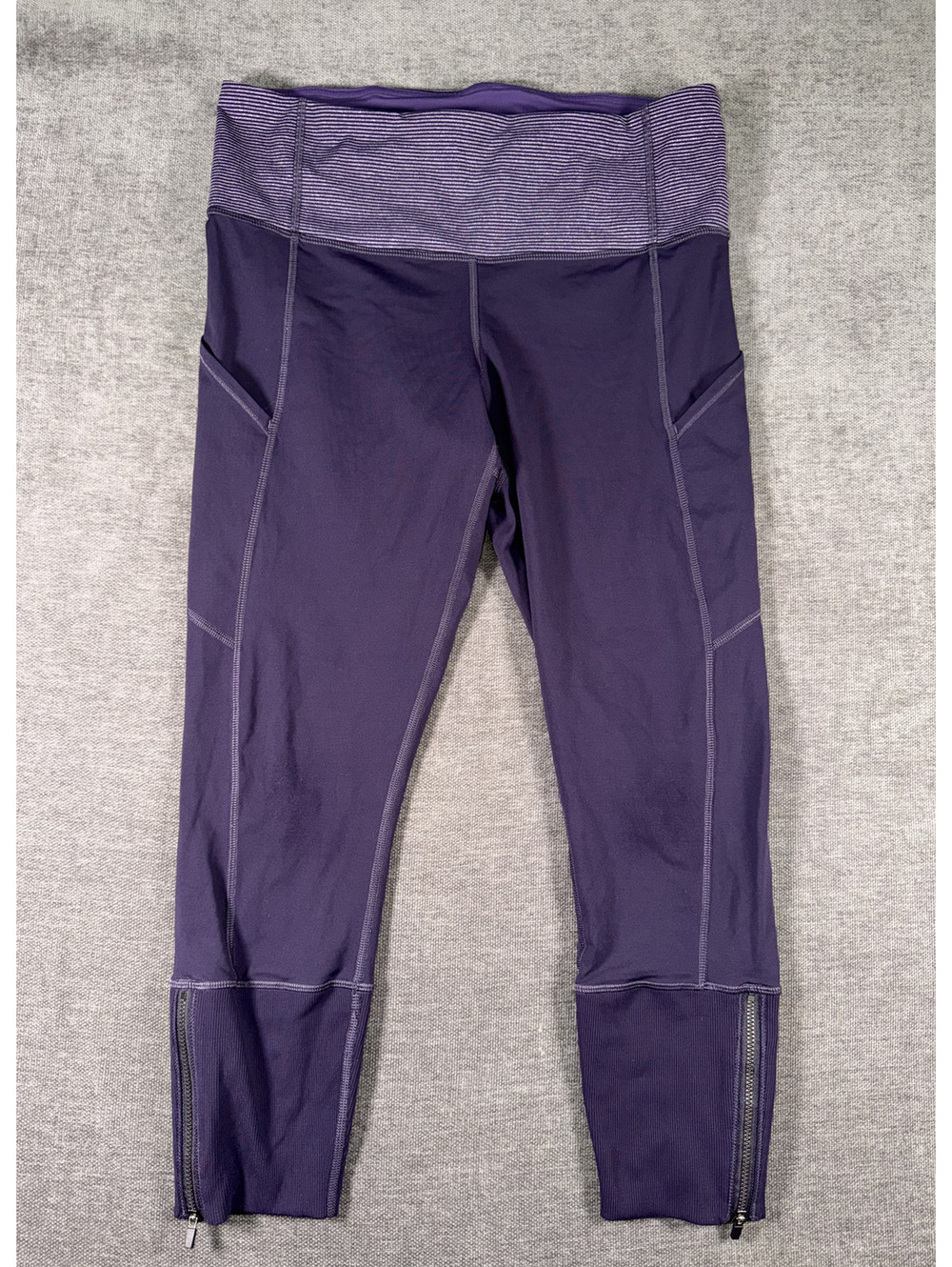Lululemon Purple Athletic Leggings with Side Pockets and Ankle Zippers, Size 10